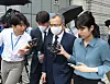 Former special counsel Park Young-soo is surrounded by reporters as he leaves the Seoul Central District Court in Seocho District, southern Seoul, after his warrant review hearing on June 29. [NEWS1]