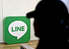 An employee of Line Plus, Line Yahoo’s Korean subsidiary, enters the company’s headquarters in Pangyo, Gyeonggi, on Tuesday. [YONHAP]