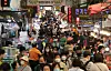 Bujeon outdoor market in Busan is crowded with customers on Sunday, a week before Chuseok, or the Korean harvest holiday, which falls on Sept. 21 this year. [SONG BONG-GEUN]