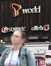 A pedestrian walks past a telecom retail branch in Seoul, Monday. The government announced Monday that it will encourage mobile carriers to offer mid-range 5G subscription plans starting from the third quarter of this year, in order to ensure broader consumer choices for those who prefer monthly data usage plans varying from 20 to 100 gigabytes. Currently available options offer either 10 to 12 gigabytes of data a month, or 110 to 150 gigabytes. SK Telecom said that it is currently considering diversifying subscription options during a conference call on May 10. [YONHAP]