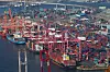 Shipping containers are stacked at a pier in Busan on Nov. 21. [YONHAP]
