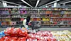 A person shops for ramyeon displayed at a discount mart in Seoul on Sunday. [YONHAP]
