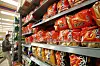 Nongshim's flagship Saewookkang, or shrimp-flavored chips, are displayed at a local supermarket in Seoul on Sunday. Nongshim marked Saewookkang's 50th birthday this year. The popular snack has sold more than 8.2 billion units since its launch in 1971. [YONHAP]