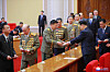 Delegates of the North's ruling Workers' Party receive certifications for their participation in the upcoming eighth Party Congress to be held early next month, as shown in a state media photograph. Representatives from across the country have already gathered in Pyongyang for the event. [YONHAP]