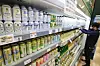 An employee organizes cans of non-alcoholic beer on a shelf at a discount store in Seoul on Thursday. As more Koreans prefer to drink responsibly, competition for non-alcoholic beer is heating up. Hite Jinro was the first to enter the market, followed by Chinese Tsingtao, which launched a low-alcohol beer on June 11. Market leader Oriental Brewery Company said it plans to launch a non-alcoholic beer this year. [YONHAP]