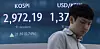 A screen in Hana Bank's trading room in central Seoul shows the Kospi closing at 2,972.19 points on June 18, up 21.89 points, or 0.74 percent, from the previous trading session. [YONHAP]