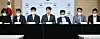 Lee Myung-soon, Financial Services Commission director general on consumer finance, center, announcing government measures against financial fraud with officials from other government departments, including the Justice Ministry, the police and the tax agency at the government complex in Seoul on Tuesday. [YONHAP]