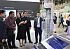 Attendees of the 2024 World Climate Industry Expo (WCE) observe a model of a small modular reactor made by Doosan for use in aviation and power generation on Wednesday. [YONHAP]