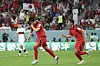 Kim Young-gwon, left, celebrates with Jung Woo-young scoring Korea's first goal during the Group H match between Korea and Portugal at the 2022 FIFA World Cup at Education City Stadium in Al Rayyan, Qatar on Friday. [XINHUA/YONHAP]