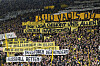Fans hold up banners protesting against investors in German football during the Bundesliga match between Borussia Dortmund and Union Berlin in Dortmund, Germany on April 8. [AP/YONHAP]