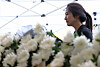 A woman shed tears in front of the memorial of the 23 year-old teacher at Seo 2 Elementary School in Seocho-dong, Gangnam, Seoul, on Monday, which marks the 49th day since the teacher took her own life. A nationwide mourning took place while teachers demanded that the government take more aggressive actions in protecting teachers’ rights from legal harassments from parents. [YONHAP]