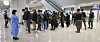 People arriving from China being tested for Covid-19 at Incheon International Airport earlier this month. [YONHAP]