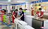 North Korean workers disinfect a department store in Pyongyang, according to footage released by Korean Central Television in August. [YONHAP]