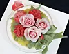 A tteok cake decorated with roses made of tteok. [PARK SANG-MOON]