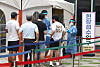 People wait in line to get tested for Covid-19 at a testing center in Gangnam District, southern Seoul, Friday. [YONHAP]