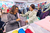 Korean first lady Kim Hea Kyung, right, and Brazilian first lady Rosangela da Silva check fabric for traditional Korean attire, or hanbok, at Gwangjang Market in Jongno District, central Seoul, on Feb. 21. The Brazilian first lady arrived in Seoul on Saturday, a day earlier than her husband, Brazilian President Luiz Inacio Lula da Silva, who is set to hold summit talks with his Korean counterpart, President Lee Jae Myung, on Feb. 23 during his 3-day state visit to Korea. [PRESIDENTIAL OFFICE]