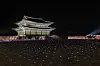 The Gyeongbok Palace's Geunjeongjeon courtyard gets lit up for the Gucci Cruise 2024 collection show on Tuesday. [GUCCI]