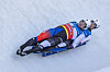 Park Jin-yong, front, and Cho Jung-myung speed down the course during the men luge double-seater competition of the Eberspaecher 5th World Cup at the Olympia Eiskanal in Innsbruck, Austria, on Saturday. [AFP/YONHAP]