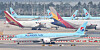 Korean Air Lines and Asiana Airlines planes parked at Incheon International Airport on Thursday. [YONHAP]