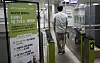An official demonstrates the tagless gate system at Samyang Sageori Station on the Ui-Sinseol line in Gangbuk District, northern Seoul, on Wednesday. [YONHAP]