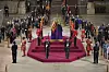 Members of the public pay their respects at the coffin of Queen Elizabeth II, lying in state in Westminster Hall at the Palace of Westminster in London early Monday, ahead of a state funeral to be held later that morning. [AP/YONHAP]