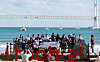 BTS fans gather at Gwangalli Beach in Busan on Thursday before joining a plogging program, which combines jogging and picking up trash. Fans have descended on the coastal city to celebrate BTS member Jimin’s birthday and the boy band’s concert on Saturday, which has been organized to promote Busan’s bid to host World Expo 2030. [YONHAP]