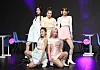 woo!ah! poses for cameras during a press showcase in southern Seoul on Thursday. [NV ENTERTAINMENT]