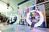 Visitors to Lotte World pose for photos at a photo zone in Songpa District, southern Seoul, on Tuesday. Lotte World is running a festival called Colorful World School until June 6, offering customers various photo zones designed as class rooms and gyms, as well as performances. [LOTTE WORLD]