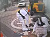 South Korean military officers clean the area where a balloon from the North Korea exploded in Seoul. [JOINT CHIEFS OF STAFF]