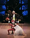 A young ballet dancer plays the role of the Nutcracker while most of the other companies use a wooden doll. [KNB]