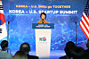 Minister of SMEs and Startups Lee Young reads the president's welcoming remarks in his stead at the Korea-U.S. Startup Summit held at Pier 17, New York, on Wednesday. [MINISTRY OF SMES AND STARTUPS]