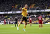 Wolverhampton Wanderers' Hwang Hee-chan celebrates after forcing an own goal off Liverpool's Joel Matip during a Premier League match at Molineux Stadium in Wolverhampton, England on Saturday. [AP/YONHAP]