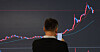 Market conditions for Bitcoin are displayed on a screen at the Bithumb headquarters, located in Gangnam, southern Seoul, on Tuesday. Bitcoin prices have climbed to a two-and-a-half-year high, peaking at over $35,100 in Tuesday's early trading session, and is now being traded at over $30,000. [YONHAP]
