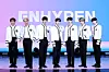 Boy band Enhypen stands for photos on Monday during an online showcase held for its first EP ″Border: Day One.″ [BELIFT LAB]