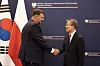 Korean Deputy Foreign Minister Kim Hee-sang shakes hands with his Polish counterpart, Jacek Tomczak, prior to their meeting in Warsaw, Poland, on Tuesday (local time). [FOREIGN MINISTRY]