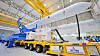The Korea Space Launch Vehicle-II (KSLV-II) is on a rocket transporter to be rolled out to the launch site on Monday at the launch vehicle assembly building at the Naro Space Center in Goheung County, South Jeolla. The scheduled launch of KSLV-II was delayed a day to Thursday due to strong wind, KARI announced Tuesday. [KARI]]