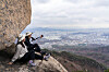 Young hikers take pictures on Yeongbong Peak at Mount Bukhan in Seoul. [BAEK JONG-HYUN]