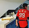 Shinsegae Group Vice Chairman Chung Yong-jin is seen wearing what appears to be the new jersey for the SSG Landers in a photo posted on social media. Shinsegae Group bought the Landers earlier this year and are set to officially reveal the new uniform in a press conference on Tuesday. [YONHAP].