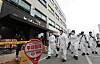 Police, firefighters and forensic officials enter a building in Icheon, Gyeonggi, the site of a fire that killed five people last Friday, to conduct a second joint inspection on Monday. The fire killed four patients and a nurse at a dialysis hospital on the top floor of the building. [NEWS1]