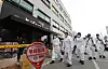 Police, firefighters and forensic officials enter a building in Icheon, Gyeonggi, the site of a fire that killed five people last Friday, to conduct a second joint inspection on Monday. The fire killed four patients and a nurse at a dialysis hospital on the top floor of the building. [NEWS1]