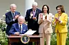U.S. President Joe Biden, seated left, signed a proclamation on Tuesday establishing July 27 as National Korean War Veterans Armistice Day in the United States. [AP/YONHAP]
