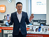 Xiaomi Korea’s general manager Jony Wu holds the new Xiaomi 15T smartphone and earbuds during Thursday’s press event at the Pullman Ambassador Seoul Eastpole in Guui, eastern Seoul. [XIAOMI KOREA]
