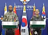 Col. Lee Sung-jun, right, the spokesperson for South Korea's Joint Chiefs of Staff, and U.S. Forces Korea spokesperson Col. Isaac L. Taylor address a joint press conference on combined military drills at Seoul's defense ministry in Seoul on Friday. [YONHAP]