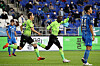 Jeonbuk Hyundai Motors players, in green, celebrate after Mo Barrow scored the opener during a match against Ulsan Hyundai FC at Munsu Football Stadium in Ulsan on Sunday. [NEWS1]