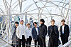 BTS stands next to Antony Gormley's installation piece 'New York Clearing' as a part of its contemporary art project 'CONNECT, BTS' earlier this year. [BIG HIT ENTERTAINMENT]