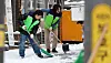 Public officials from Seodaemun District Office in western shovel the snow-covered road in their neighborhood on Thursday morning after heavy snowfall overnight. [NEWS1]