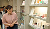 Weightlifting champion Jang Mi-ran, who was named second vice minister of culture, sports and tourism last month, tours Amore Seongsu in eastern Seoul during the opening ceremony for the Korea Summer Beauty Sale on Thursday. [MINISTRY OF CULTURE, SPORTS AND TOURISM]