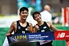 Jun Woong-tae, left, and Kim Sun-woo celebrate after winning the mixed relay event at the UIPM 2022 Pentathlon World Championships in Alexandria, Egypt on Sunday. [XINHUA/YONHAP]