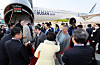 The Bureau of International Expositions (BIE) delegation, after concluding its on-site inspection in Busan, boards a special plane prepared by Air Busan at Gimhae International Airport on Friday morning for their return trip to Incheon. [YONHAP]