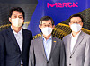 From left: Chung Do-young, director-general for economic planning at the Gyeonggi Provincial Government; Kim Woo-kyu, managing director at Merck Korea; and Choi Won-yong, deputy mayor of Pyeongtaek City pose for photos during a completion ceremony of Merck Korea's organic light-emitting diode (OLED) facility construction in Gyeonggi on Wednesday. [MERCK KOREA]